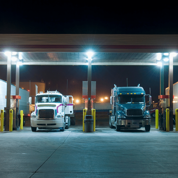 Fueling a semi-truck at a truck stop to illustrate operating costs